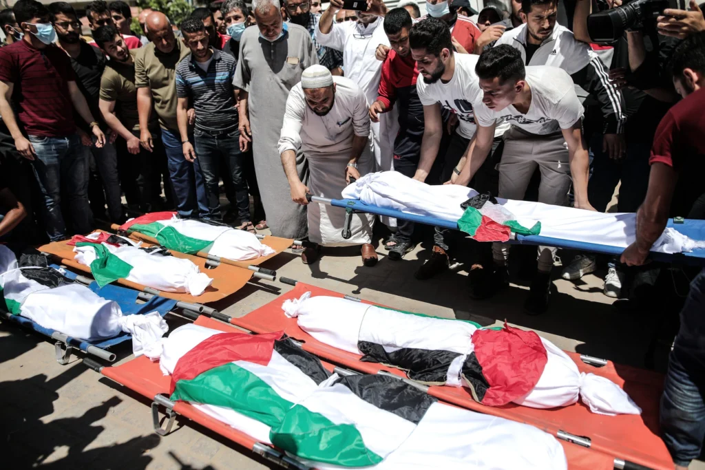 Israeli Airstrike on Gaza School Shelter Kills Over 100 Displaced Palestinians Amid Ongoing Conflict.
