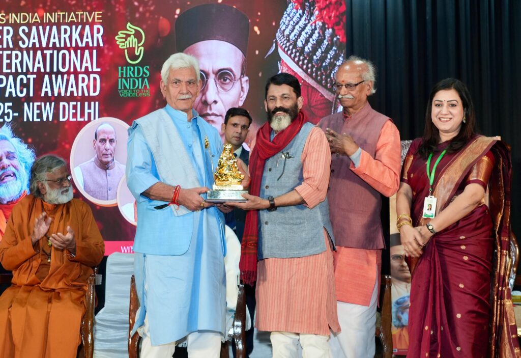 Manoj Sinha Honours Global Leaders at Veer Savarkar International Impact Awards 2025; Reaffirms 1,500-Home J&K–HRDS INDIA Rehabilitation Initiative